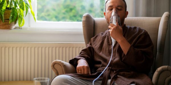 front-view-man-using-nebulizer_23-2150577289 Mask Discomfort or Irritation